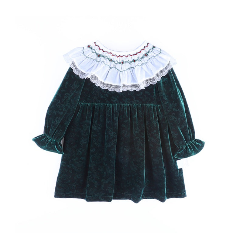 front view of forest green velvet smocked holiday dress for baby girl