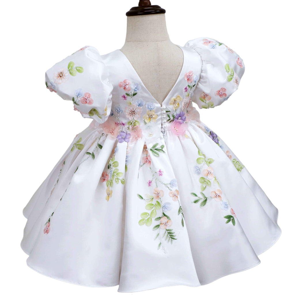 Ivory dress, full back view with pearl-button V-back