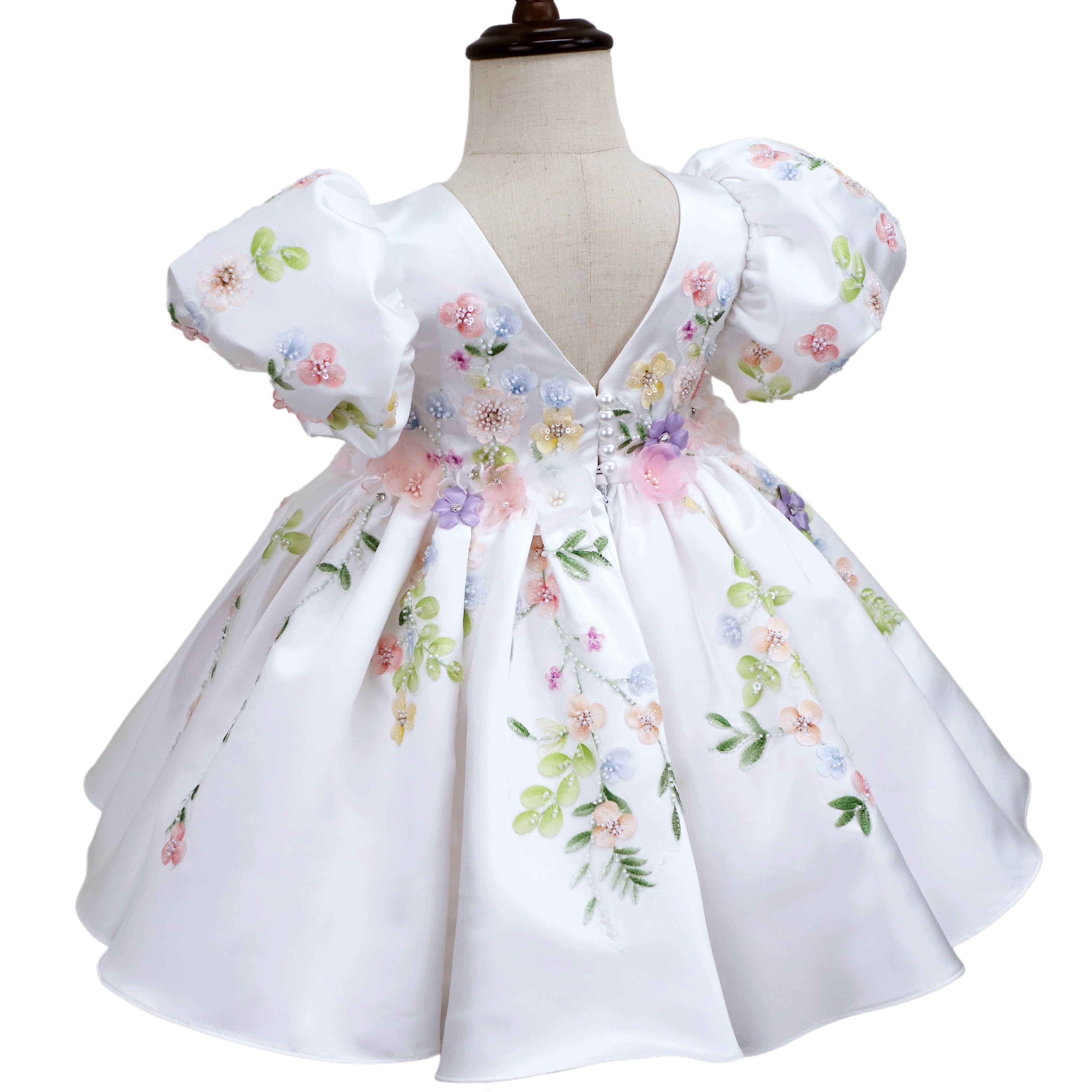 Ivory dress, full back view with pearl-button V-back