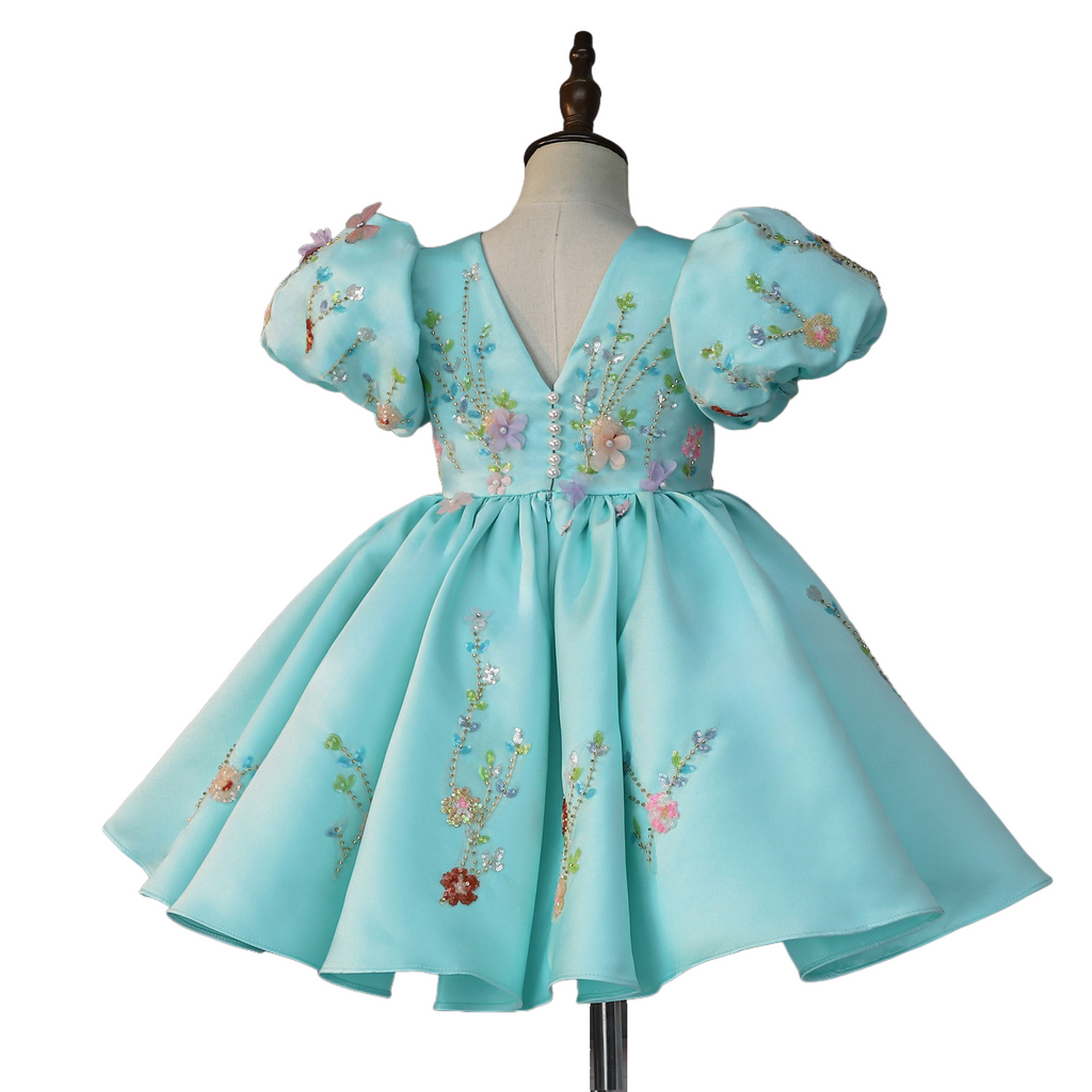 Lace-up V-back with pearl buttons, full back view