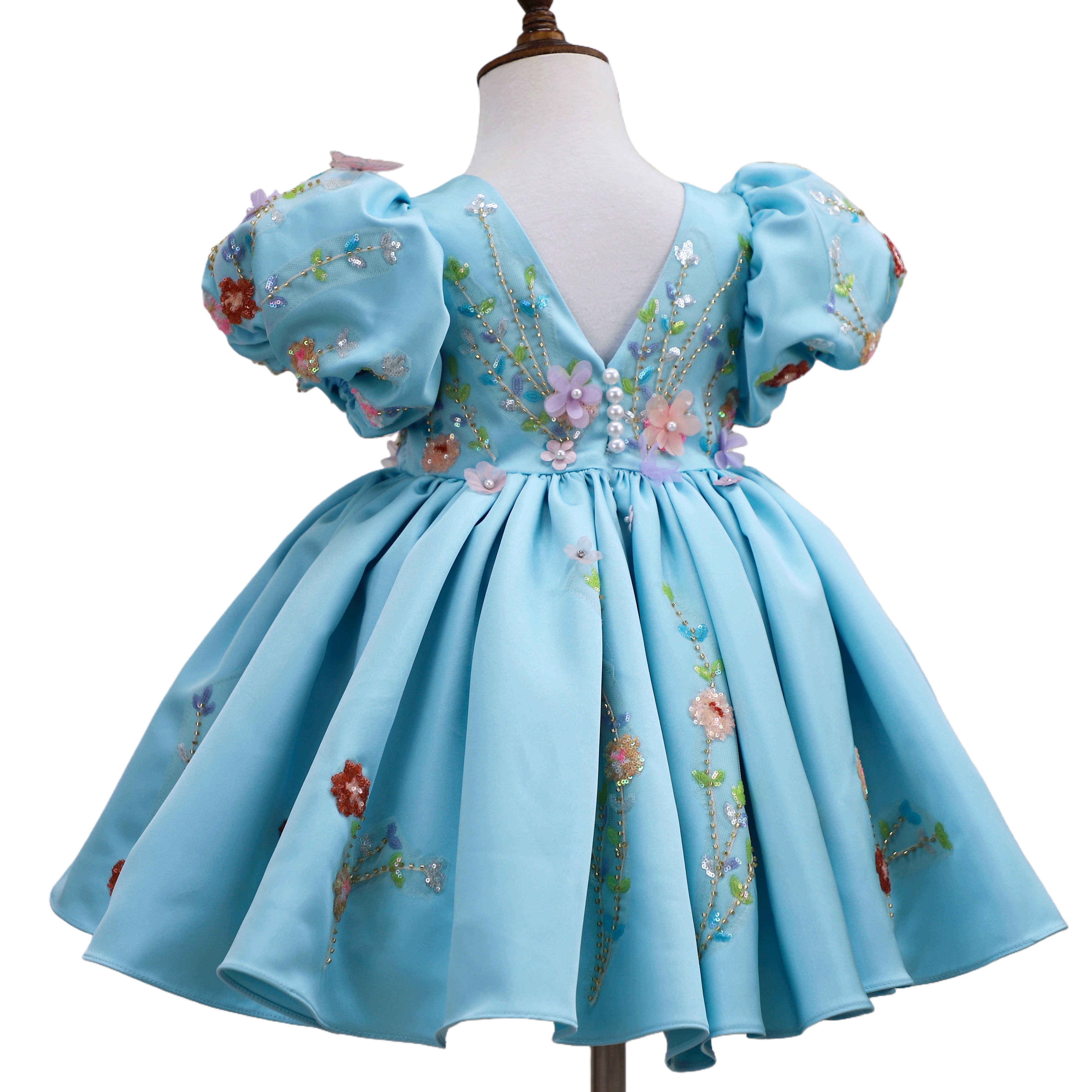 Sky blue dress, full back view with pearl-button V-back