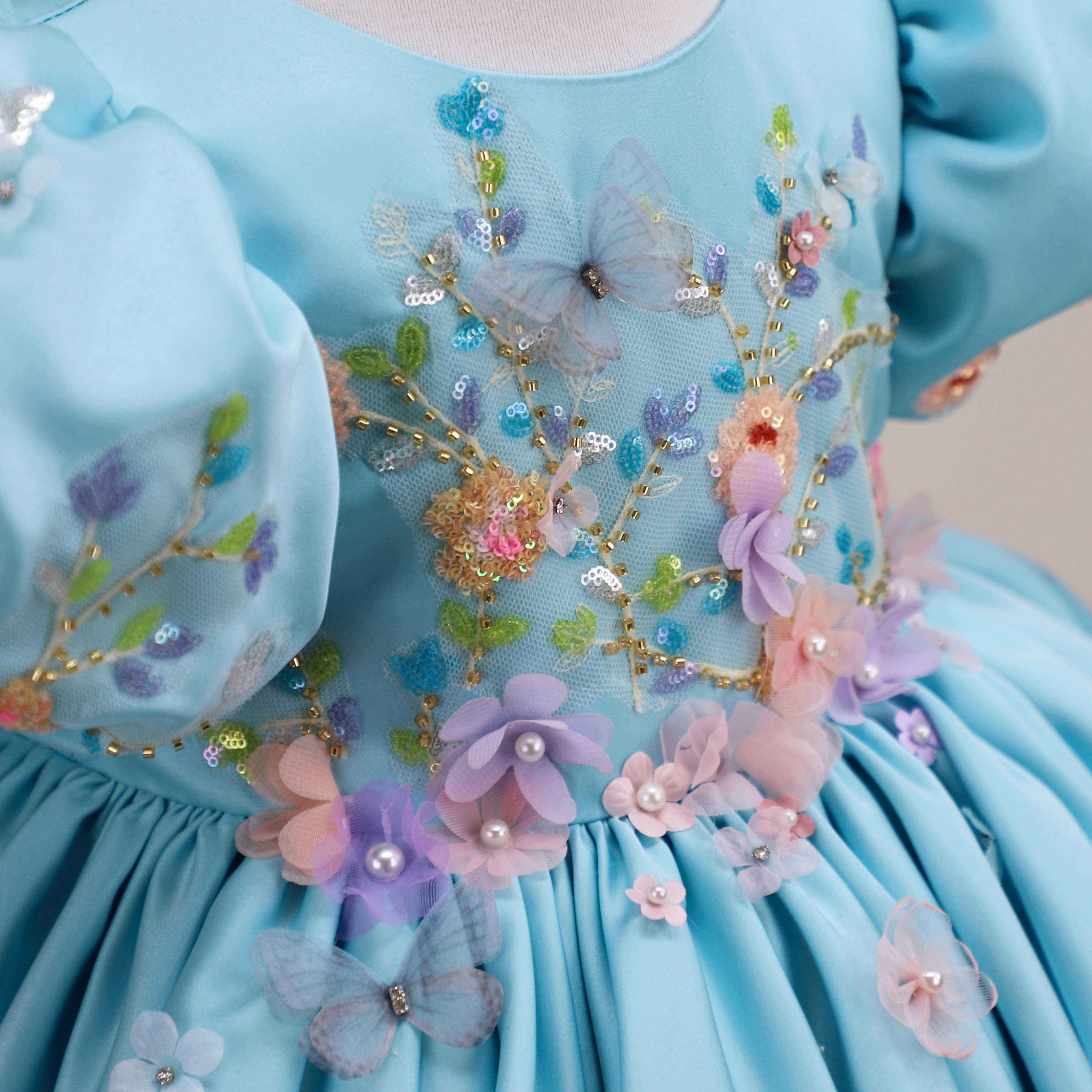 Handcrafted 3D florals with pearls and crystals, close-up