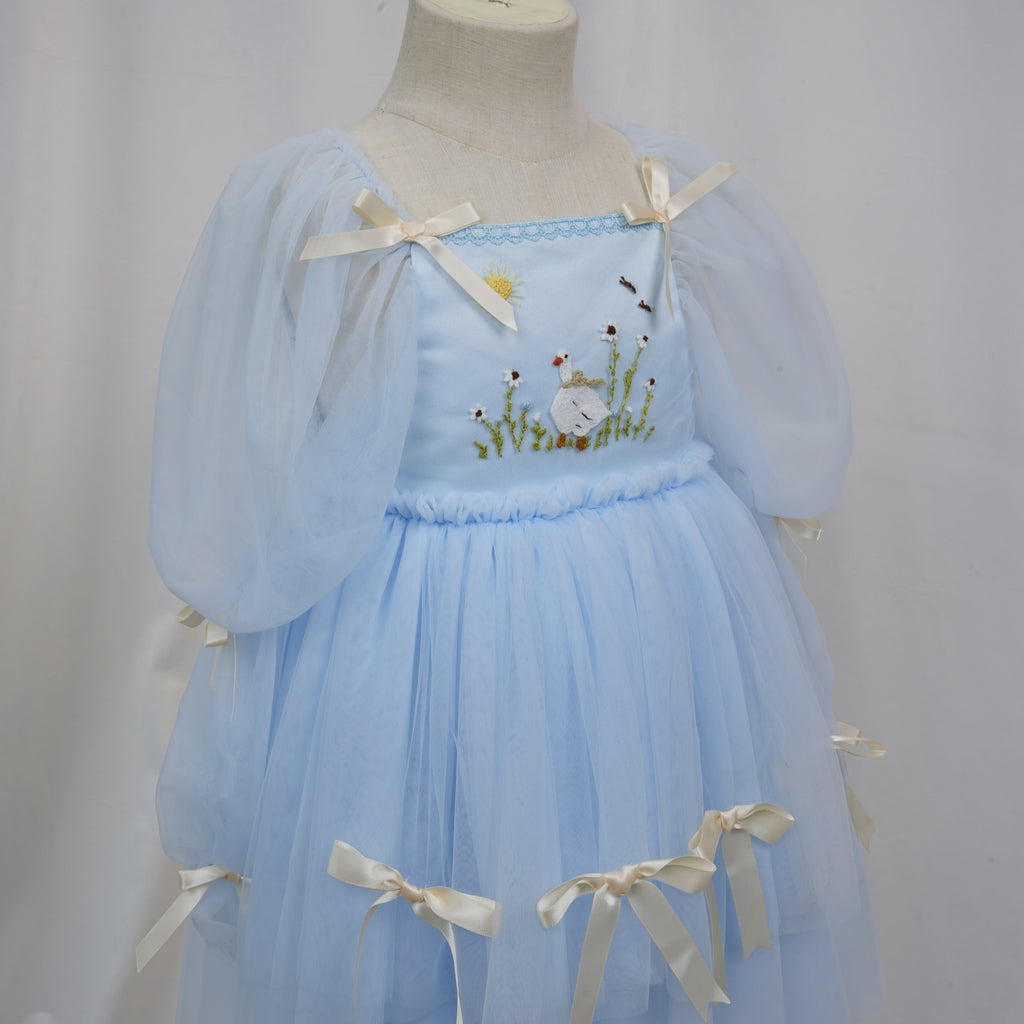 Ribbon bow details on light blue silly goose toddler dress
