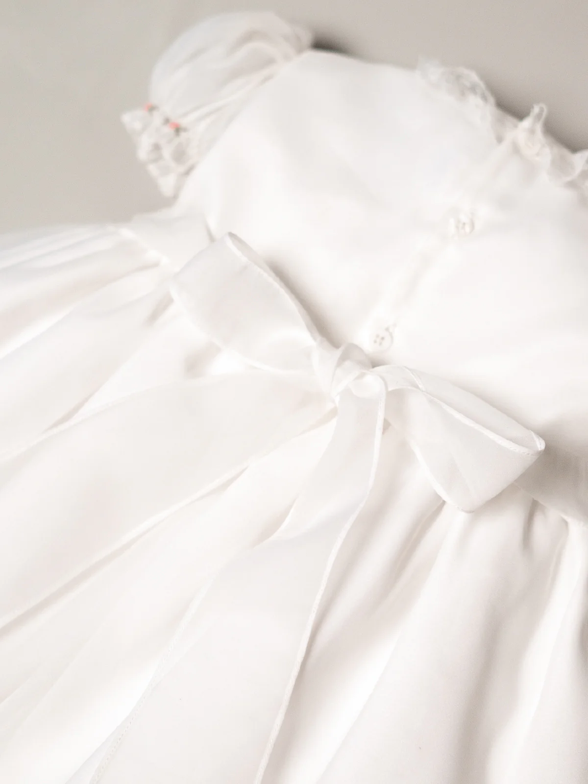 White Rosebud Smocked Baby Dress