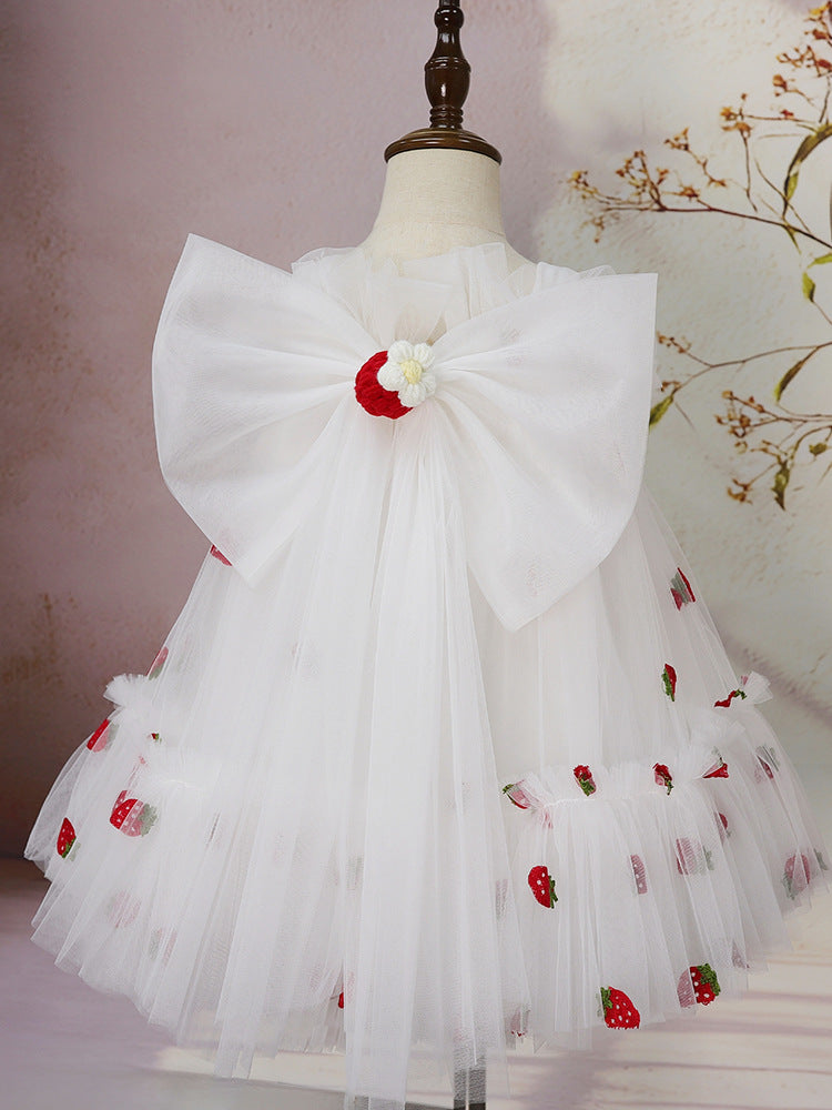 Back view of white strawberry tulle dress with oversized bow